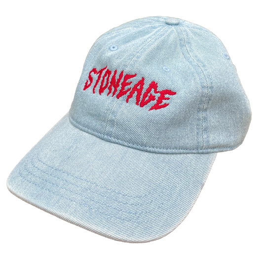 Light blue denim cap with red 'STONEAGE' logo on a white background